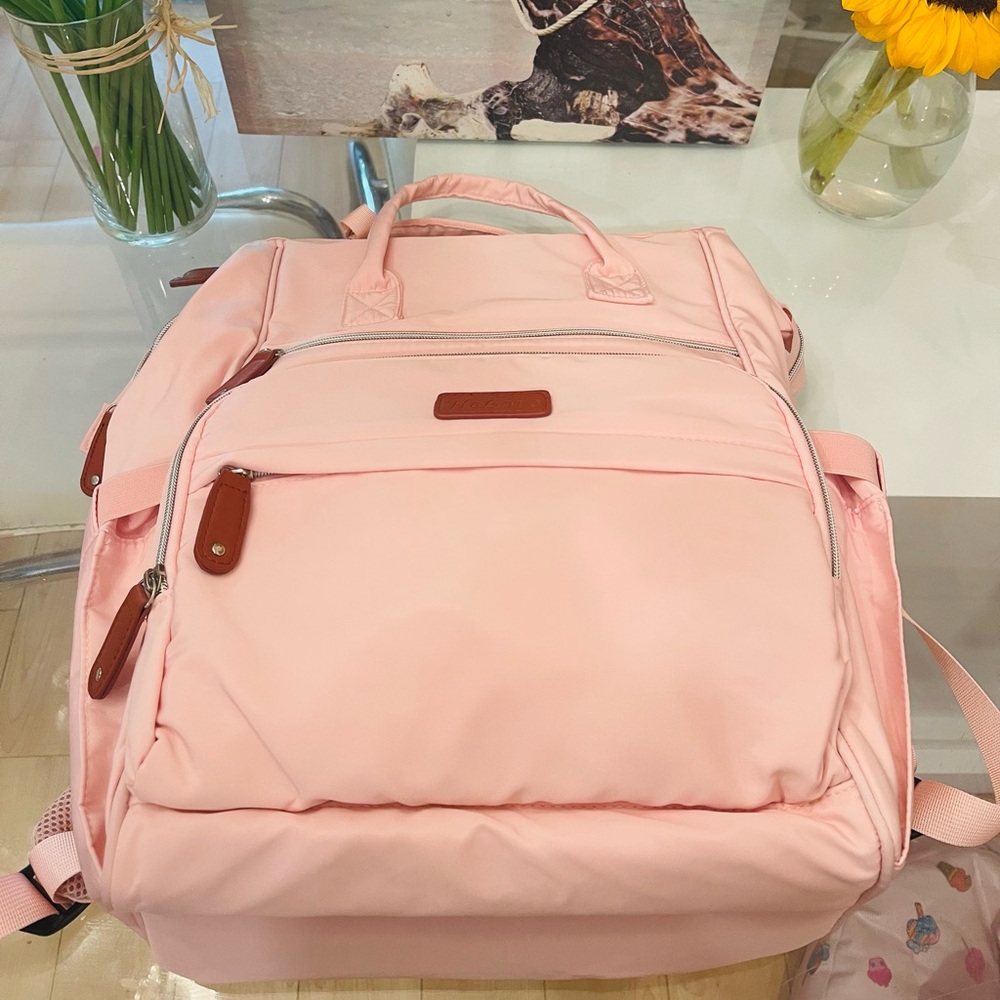 Nursery Pink Backpack with changing mattress.